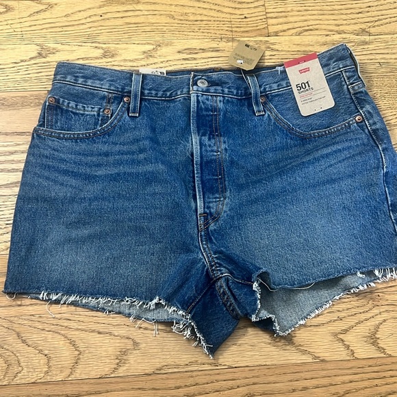Levi's Pants - Levi's Blue Jean Shorts with Distressed‎ Hem size 34